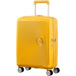 Plastové kufry American Tourister v žluté barvě na čtyřech kolečkách 