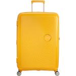 Plastové kufry American Tourister v žluté barvě na čtyřech kolečkách o objemu 110 l 