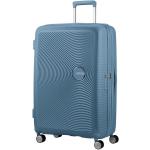 Plastové kufry American Tourister v modré barvě na čtyřech kolečkách o objemu 110 l 