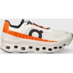 Dámské Běžecké boty On running Cloudmonster v bílé barvě z látky ve velikosti 42 s tlumením nárazu 