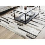 Béžovo-hnědý kožený koberec 140 x 200 cm TIPILI