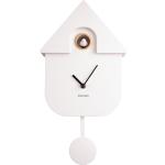 Bonami Bílé nástěnné kyvadlové hodiny Karlsson Modern Cuckoo, 21,5 x 41,5 cm