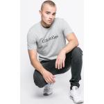 Designer  Trička s potiskem Calvin Klein v šedé barvě z bavlny ve velikosti S 