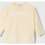 Dětská trička s potiskem Chlapecké v béžové barvě z bavlny ve velikosti 6 let Designer od značky Calvin Klein Jeans z obchodu Answear.cz 