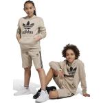 Dětské mikiny s kapucí Dívčí v béžové barvě z bavlny ve velikosti 8 let ve slevě od značky adidas Originals Trefoil z obchodu Answear.cz 