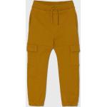 Dětské tepláky Chlapecké v žluté barvě z bavlny od značky United Colors of Benetton z obchodu Answear.cz 