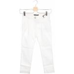 Dětské kalhoty v bílé barvě ve slevě 