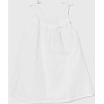 Dětské šaty Dívčí v bílé barvě lněné ve velikosti 6 let od značky United Colors of Benetton z obchodu Answear.cz 