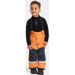 Dětské lyžařské kalhoty Chlapecké v oranžové barvě z polyesteru ve velikosti 12 měsíců ve slevě od značky Didriksons z obchodu Answear.cz s poštovným zdarma 