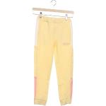 Dětské sportovní kalhoty NAME IT v žluté barvě ve slevě 
