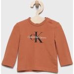 Dětská trička s potiskem Chlapecké v hnědé barvě z bavlny ve velikosti 68 strečové Designer od značky Calvin Klein Jeans z obchodu Answear.cz 