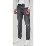 Pánské Designer Slim Fit džíny Calvin Klein Jeans v šedé barvě z bavlny šířka 32 délka 34 ve slevě 
