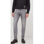 Pánské Designer Slim Fit džíny Calvin Klein Jeans v šedé barvě z bavlny šířka 33 délka 34 ve slevě 