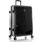 Plastové kufry Heys v černé barvě v lakovaném stylu s leopardím vzorem na čtyřech kolečkách 