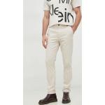 Pánská BIO Designer  Jarní a podzimní móda Calvin Klein v béžové barvě slim fit z bavlny šířka 33 délka 34 