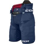 Hokejové kalhoty CCM v tmavě modré barvě 
