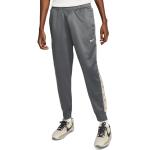 Pánské Běžecké kalhoty Nike Repeat v šedé barvě z polyesteru ve velikosti M 