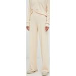 Dámské Designer Legíny Calvin Klein v béžové barvě ve velikosti L s vysokým pasem 