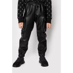Kožené kalhoty Guess v černé barvě regular z koženky 
