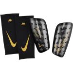 Fotbalové chrániče Nike Mercurial ve zlaté barvě ve slevě 