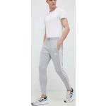 Fitness kalhoty adidas Essentials v šedé barvě ve velikosti L 