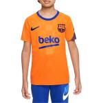 Dětská trička s krátkým rukávem Nike FC Barcelona v oranžové barvě s motivem FC Barcelona ve slevě 