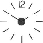 Nástěnné hodiny Umbra v černé barvě z kovu 